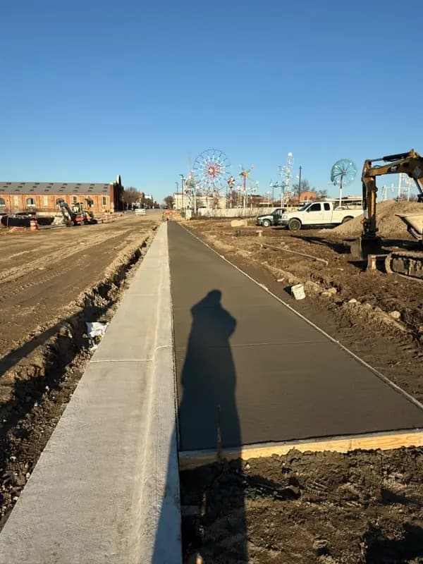 New curb and sidewalk on a commercial site