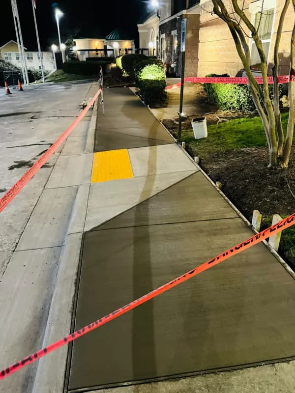 New sidewalk with tactile warning pad